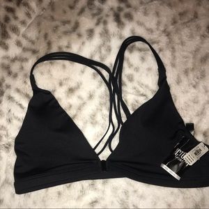 VS front clasp strappy back sports bra size large.